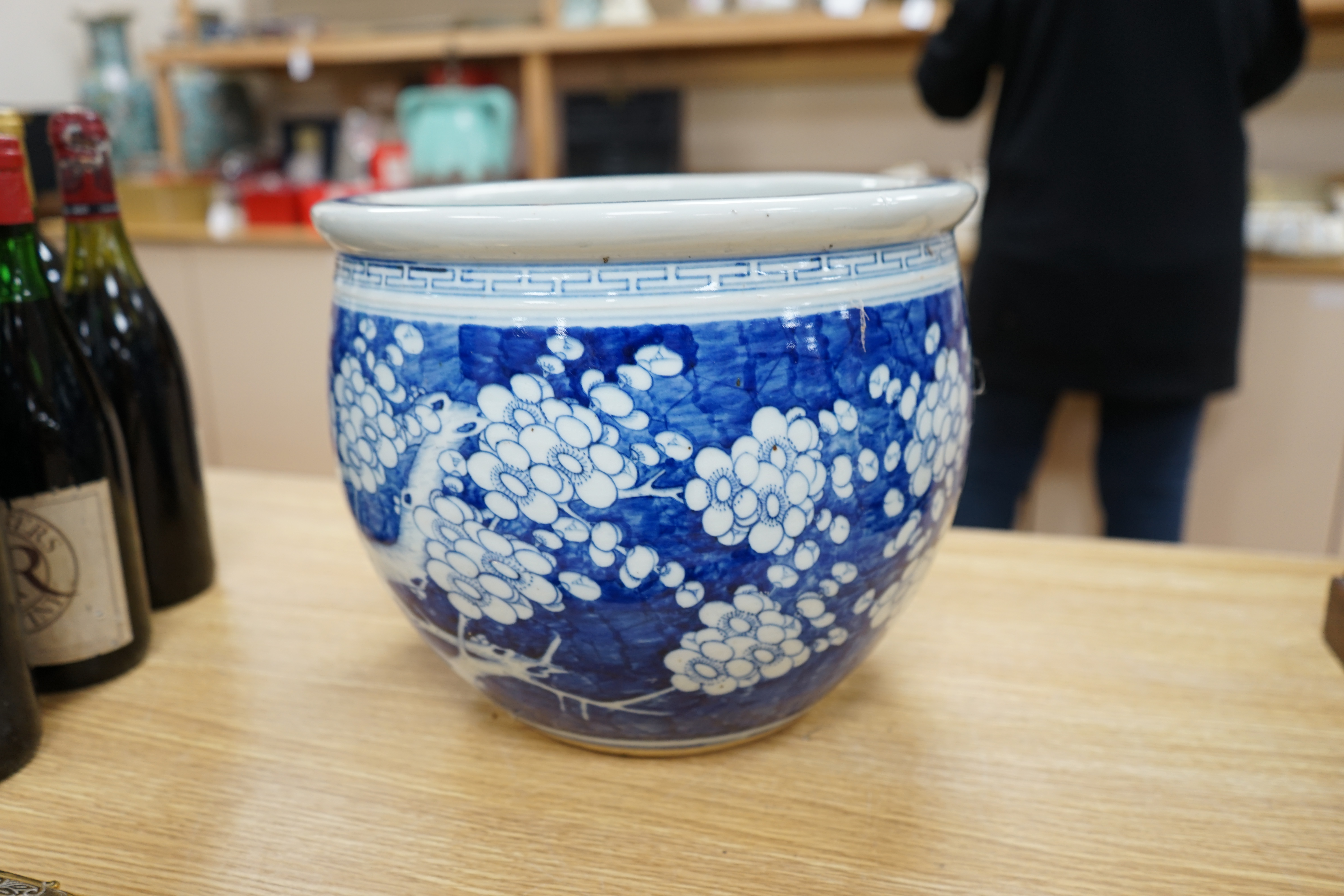 A large Chinese blue and white prunus flower planter, 32cm in diameter. Condition - fair to good